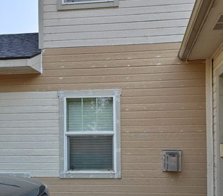 The wall re-sided and painted to match